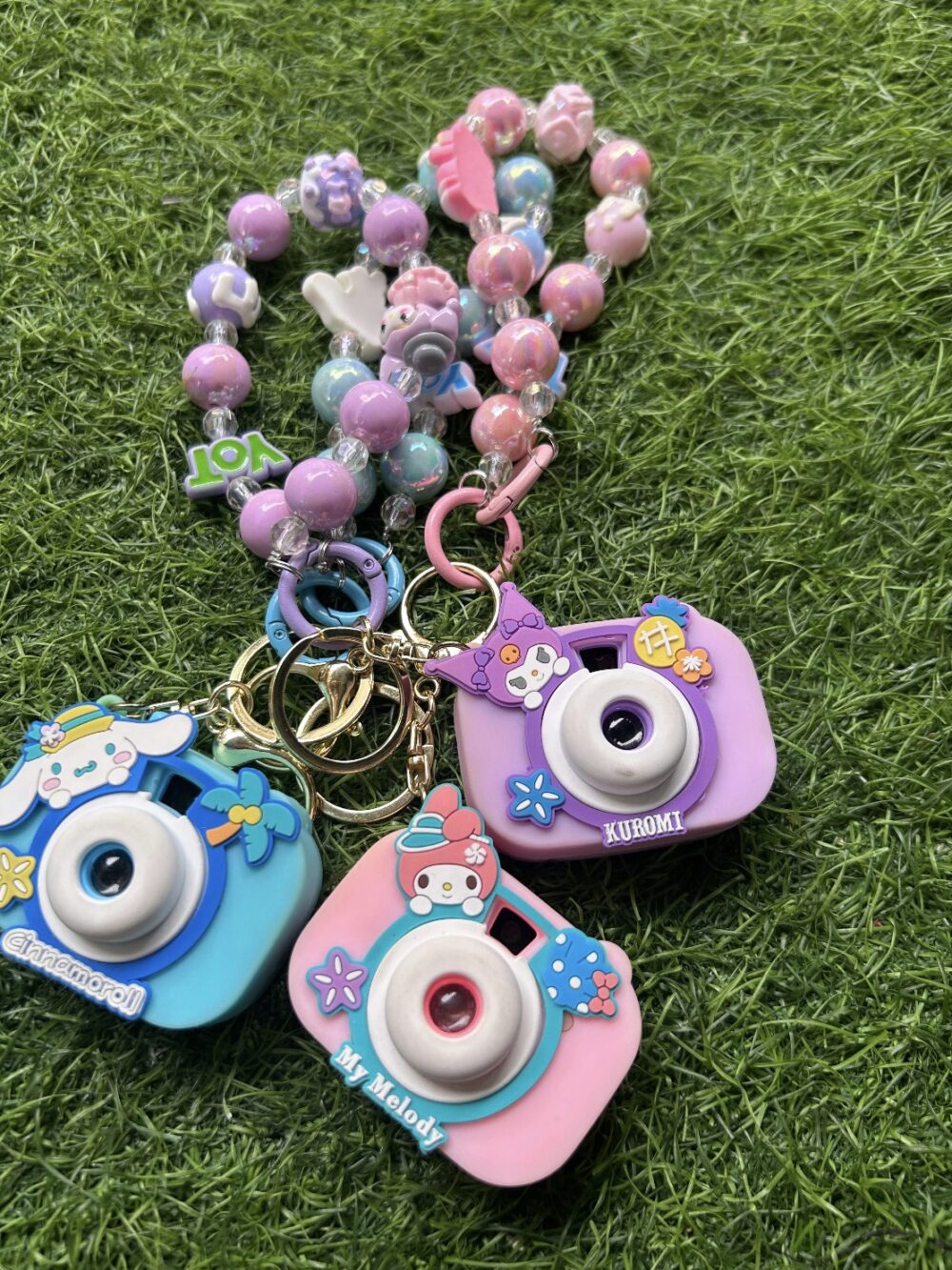 d1bb0a64-b715-4fb1-853b-fe6c00819d2c Camera projector keychain